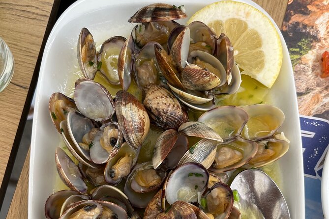 Albufeira Food Experience: Land & Sea Tapas w/ Wines - Pickup, group size, and timing