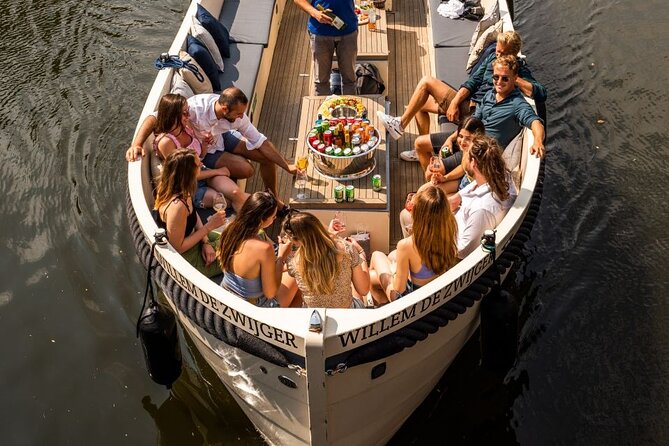 Amsterdam: Canal Booze Cruise with Unlimited Drinks Option - Starting near Dam Square or in the city center