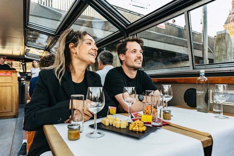 Amsterdam: Cozy Cheese & Wine Cruise Tasting Experience - A warm seat above Amsterdam’s nighttime canals
