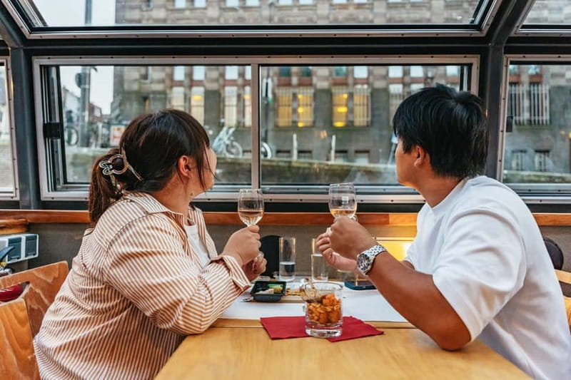 Amsterdam: Cozy Cheese & Wine Cruise Tasting Experience - What the guides add to the ride