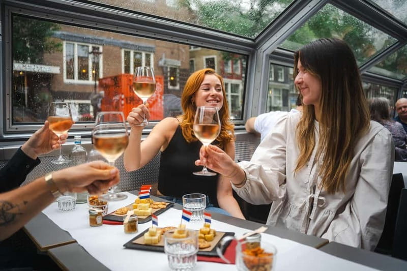 Amsterdam: Cozy Cheese & Wine Cruise Tasting Experience - Settling in with Dutch cheese and a full glass