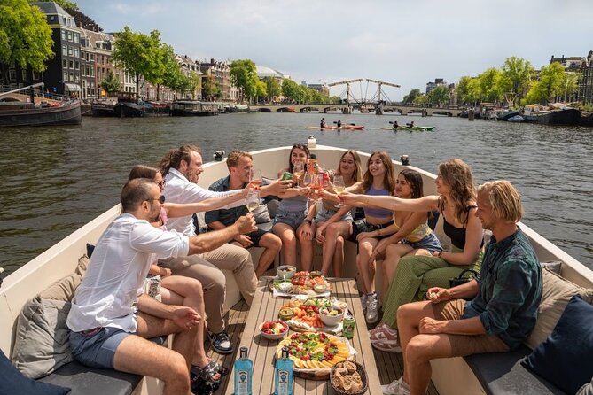 Amsterdam: Evening Candle Light Cruise With Wine & Cheese - Why Amsterdam Looks Best from a Candlelit Boat