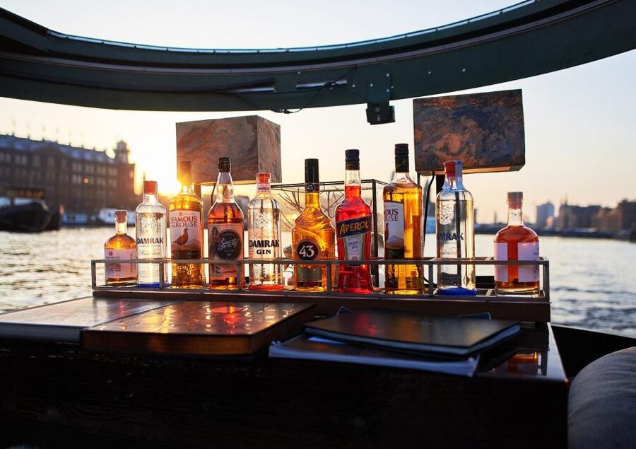 Amsterdam: Luxury Saloon Boat Cruise with Cocktails & Waffle - How the crew shapes the ride