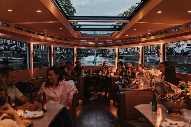 Amsterdam Small-Group Evening Canal Cruise Including Wine, Craft Beer, Cheese - What the 90-minute route feels like
