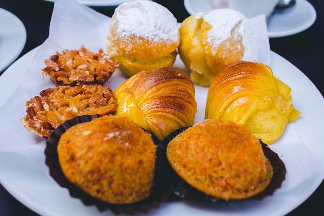 Authentic Food and Wine Tour in Porto by Food Lover Tour - The pork sandwich and other savory bites