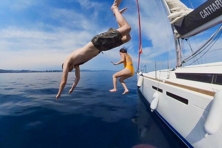 Barcelona: Coastline Boat Trip with Snacks and Cava - The swimming stop in the Mediterranean