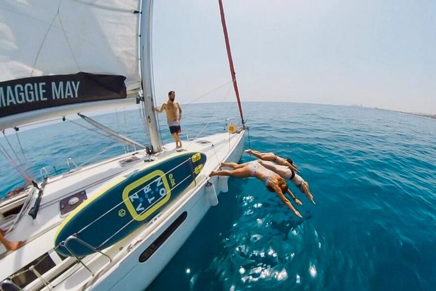 Barcelona: Coastline Boat Trip with Snacks and Cava - Cava, beer, snacks, and a relaxed onboard mood
