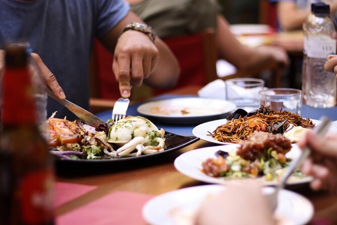 Barcelona Food Tour: Tapas, Paella, Sangria & 8+ Local Tastings - Starting beside the old Roman walls