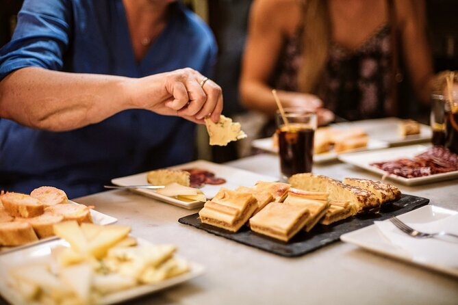 Barcelona Gothic Quarter Tapas & Taverns Food & Wine Tour - Fifty minutes through Roman and medieval Barcelona