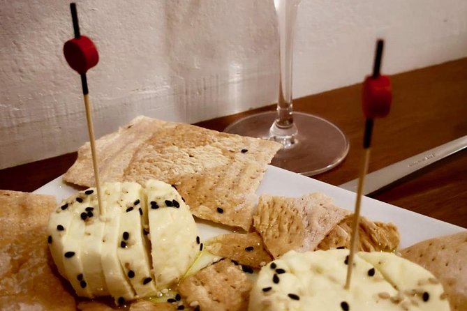 Barcelona Gothic Quarter VIP Tapas & Wine Tour - The first stop on Carrer dels Assaonadors