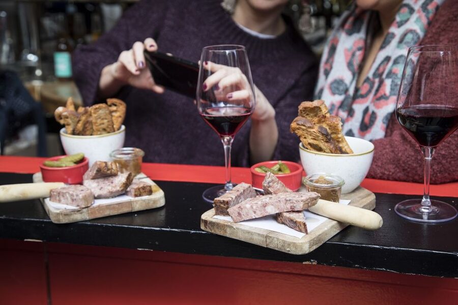 Barcelona Gourmet Food & Wine Tour with Local Expert - Second stop: music, comfort food, and a typical Eixample bar