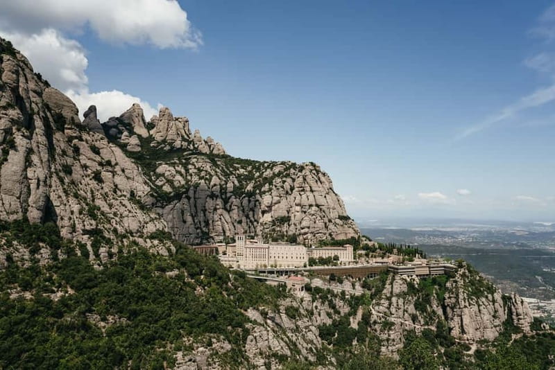 Barcelona: Montserrat, Cogwheel, Black Madonna & Winery Tour - Inside Santa Maria de Montserrat
