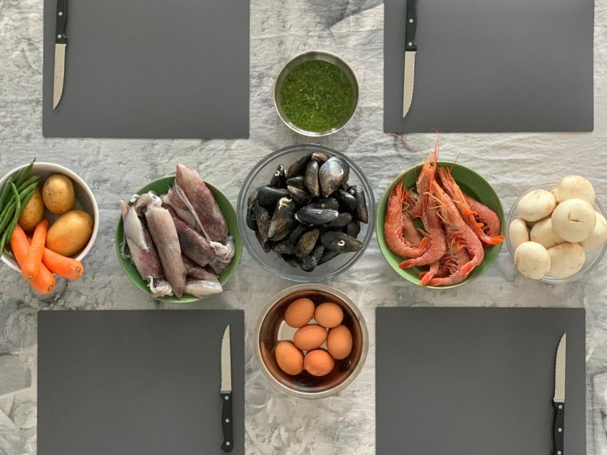 Barcelona: Rooftop Tapas and Sangria Class with a Chef - Eating on the rooftop above Port Vell