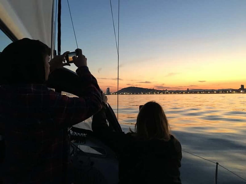 Barcelona: Sunset Boat Trip with Cava Wine and Snacks - Sunset, cava, and a slower pace