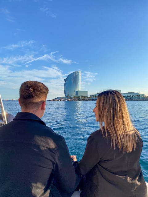 Barcelona: Sunset Catamaran Cruise with Wine and Tapa - Bow nets, rear deck, and comfortable seating