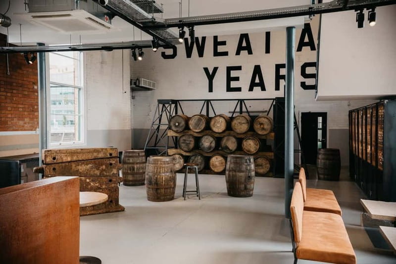 Belfast: Titanic Distillers Signature Tour & Whiskey Tasting - Following the old pumps and dock workers
