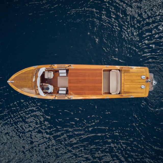 Bellagio: Shared Sunset Boat Tour with Prosecco Aperitif - What the mahogany boat feels like on the lake