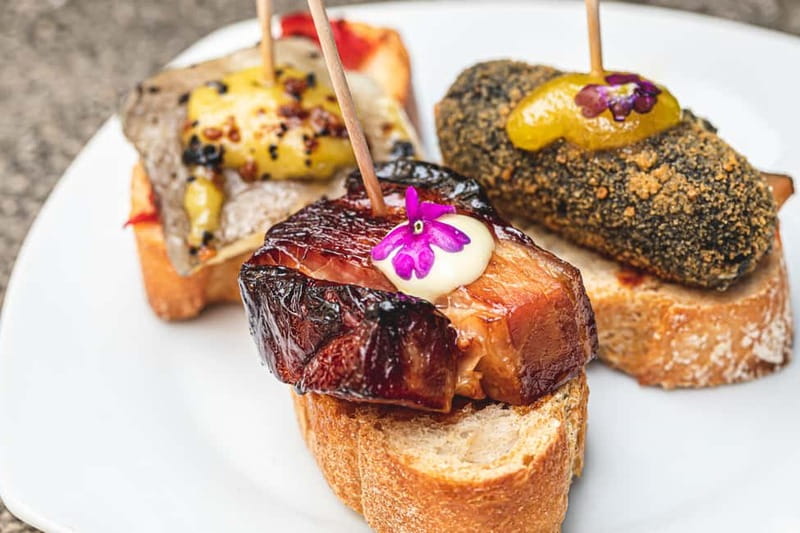 Bilbao: Basque Food Tour and Wine Tasting with Guide - Stops two and three: comparing flavors and local drinks