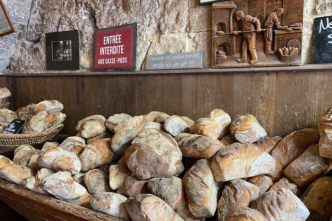 Bordeaux Old Town Food and Wine Tour - Fromagerie, butcher, and canelé shop