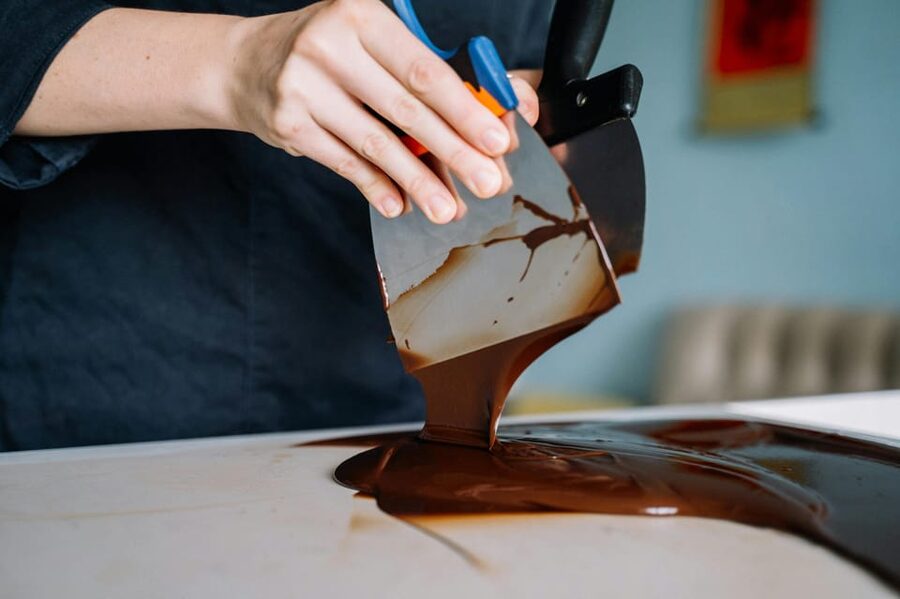 Bruges: Belgian Chocolate Making Workshop with Beer Tasting - Sharing a chocolatière with another person