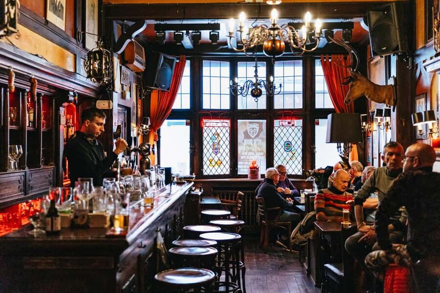 Brussels: Beer Tasting Tour with 7 Beers and Snacks - Tucked-away taverns near Grand Place