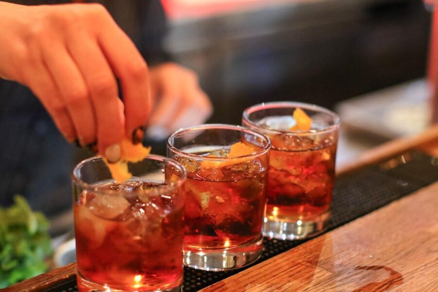 Budapest: Bar Crawl Tour with Local Drinks - Király utca 56 and three-quarter-hour bar time
