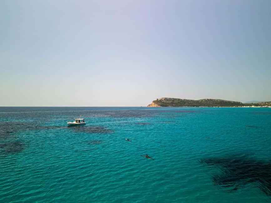 Cagliari: Boat Cruise with Stops for Swimming and Prosecco - Grotta dei Colombi from the water