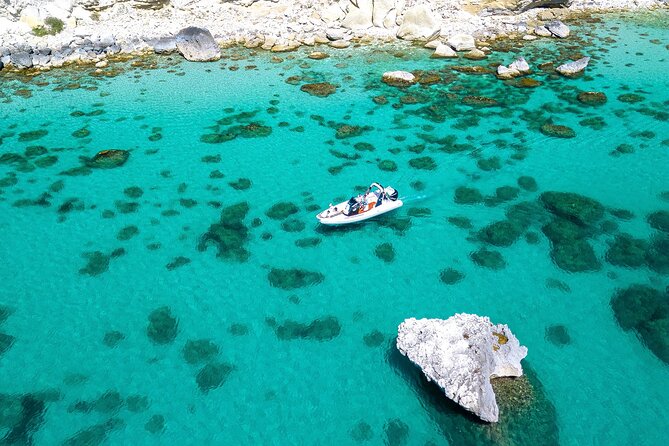 Cagliari Boat Tour with Sardatrips; Swim, Snorkeling, Sip & Snack - Torre del Poetto and the long curve of the beach