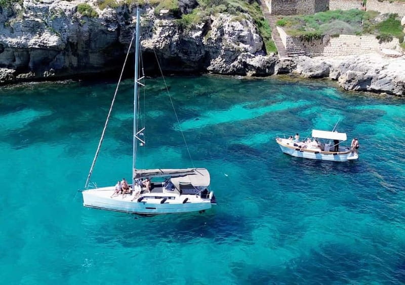 Cagliari: Catamaran Tour, Swimming, Snorkeling, & Prosecco - Leaving Portus Karalis beside central Cagliari