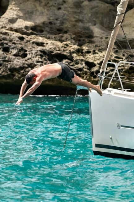 Cagliari: Catamaran Tour, Swimming, Snorkeling, & Prosecco - The return sail and the prosecco toast