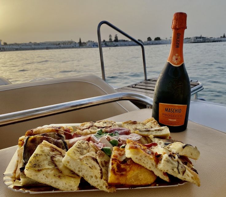 Cagliari: Sunset Boat Tour with Aperitif and Prosecco - Sella del Diavolo and the first swim