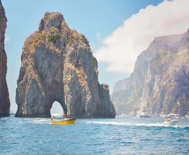Capri: Scenic Boat Tour with Swimming, Limoncello & Snack - Salto di Tiberio: the first coastal views