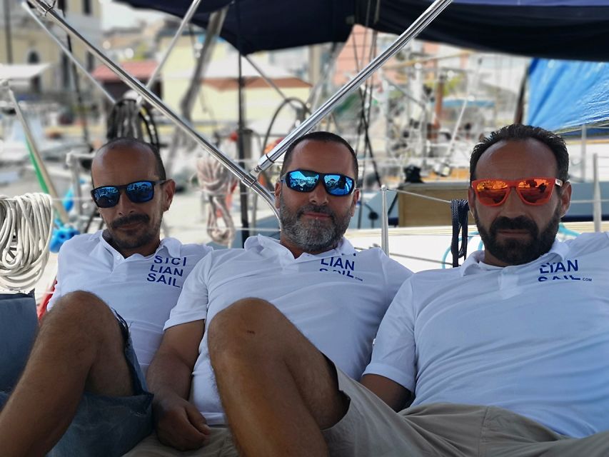 Catania: Coastline Sailing Trip with Aperitif and Prosecco - What the crew adds to the experience
