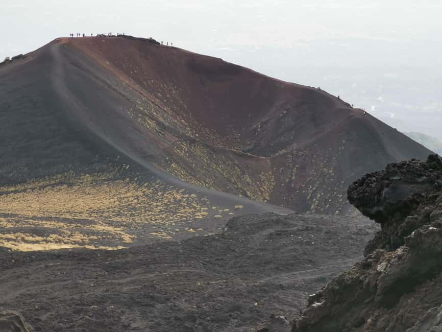 Catania: Mount Etna Sunset Trekking with Wine Tasting - Valle del Bove and the scale of Etna