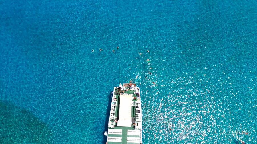 Crete: Mirabello Bay Cruise with Onboard Cocktail - Guides and languages on the day