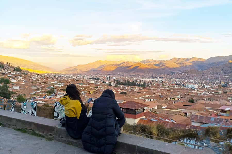 Cusco: Historic Walking Tour with Pisco Sour and Music Show - The Andean Trilogy on an Inca wall
