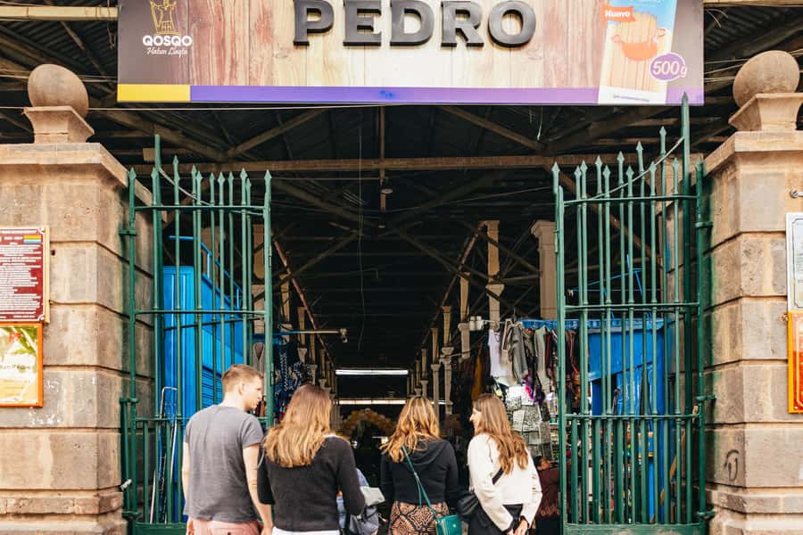 Cusco: Peruvian Cooking Class, Cocktails & Local Market Tour - Picarones and a full table of food