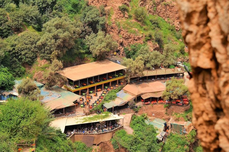 Day Trip To Ouzoud Waterfalls & Boat Ride From Marrakech - The traditional wooden boat ride