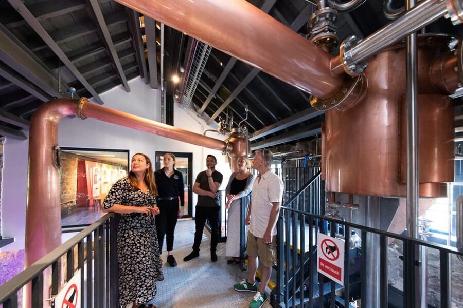 Edinburgh: Holyrood Distillery 'Journey to Whisky' Tour - On the distillery floor with new make spirit