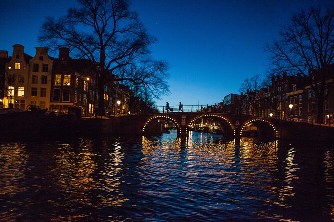 Evening Canal Cruise in Amsterdam with Wine & Cheese Option - Audio commentary, captain, and onboard atmosphere