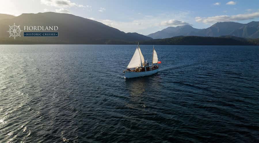 Evening Champagne Cruise on Historic 1935 Motor Yacht. - Leaving the wharf under evening light