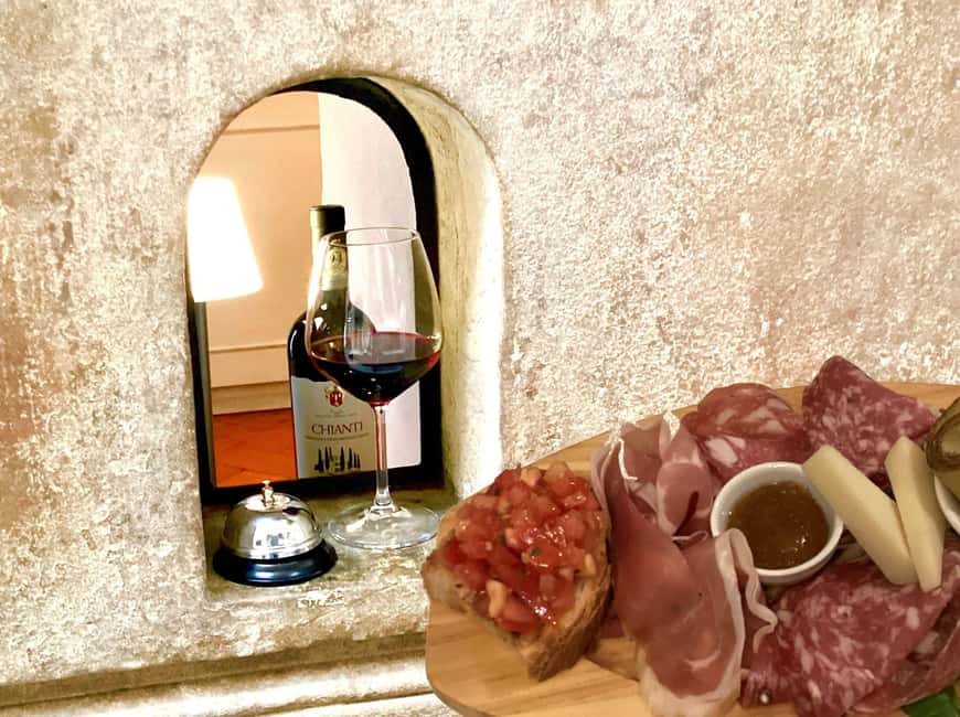 Florence: Wine Windows Walk with Wine Tasting and Appetizers - Three Tuscan wines and a full plate of local food