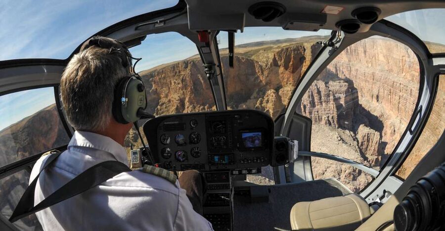 From South Rim: Grand Canyon Spirit Helicopter Tour - The Kaibab National Forest sets up the reveal