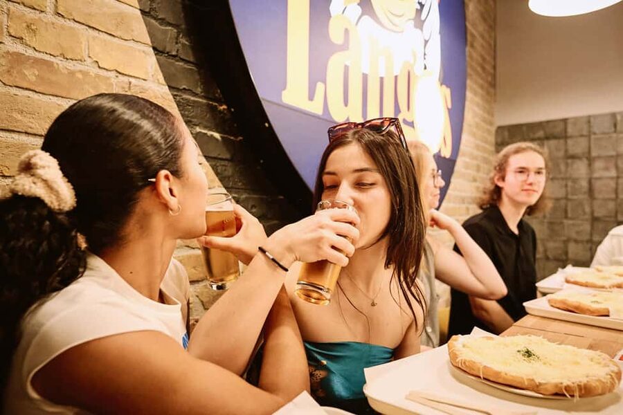 Guided Tipsy Food Tour with Drinks Included in Budapest - The synagogue meeting point and the Jewish Quarter walk