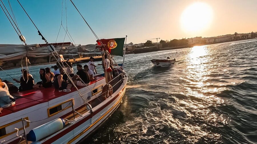 Lagos: Sunset Sail aboard a Traditional Boat with Prosecco - Staying warm on the return ride