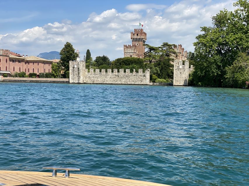 Lake Garda: Historic Castle Cruise with Wine Tasting - Torri del Benaco and the final castle view