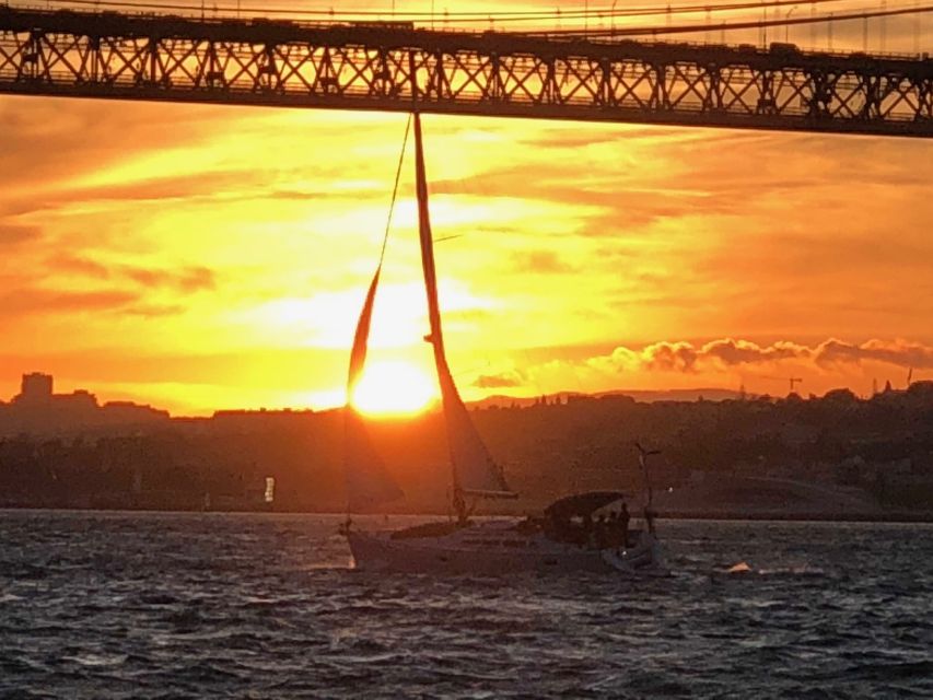 Lisbon: Private Sunset Sailing Tour with Champagne - Crossing toward Cristo Rei and the south bank