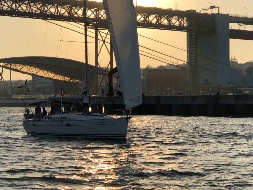 Lisbon: Private Sunset Sailing Tour with Champagne - Under the glow of the 25 de Abril Bridge