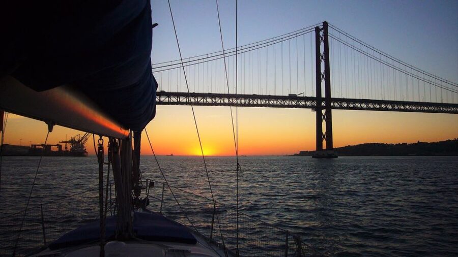 Lisbon: Private Sunset Sailing Tour with Champagne - Returning past central Lisbon