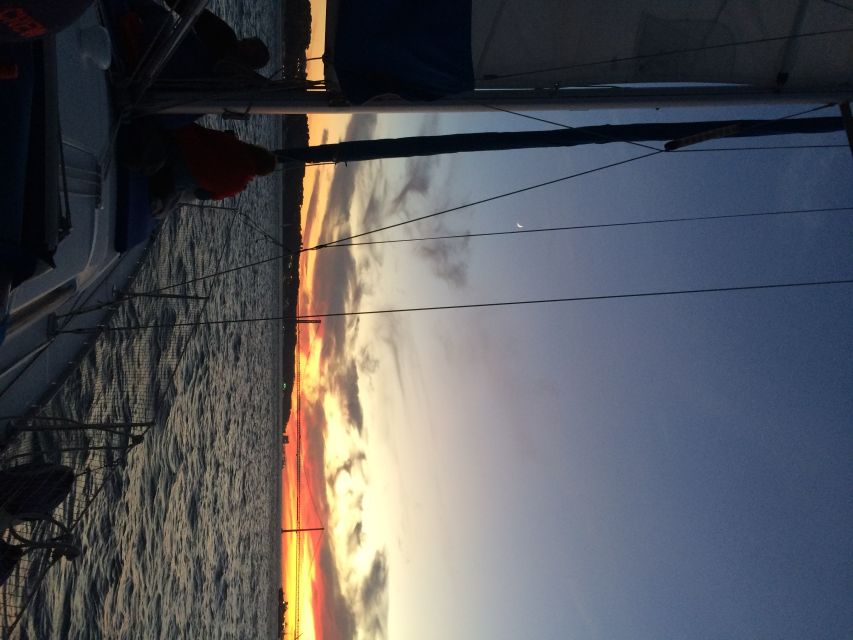 Lisbon: Private Sunset Sailing Tour with Champagne - What the crew adds to the experience